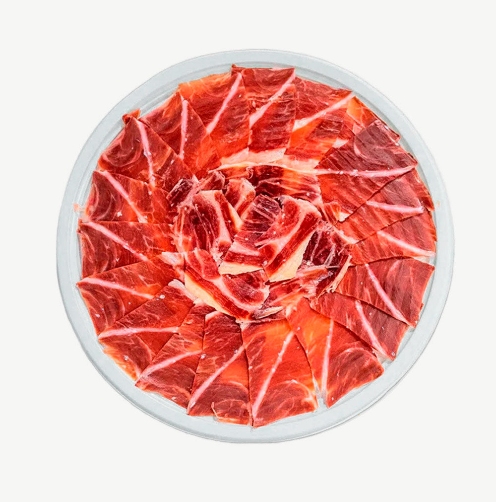 Plato jamón de bellota ibérico 50 % raza ibérica cortado a cuchillo 90g